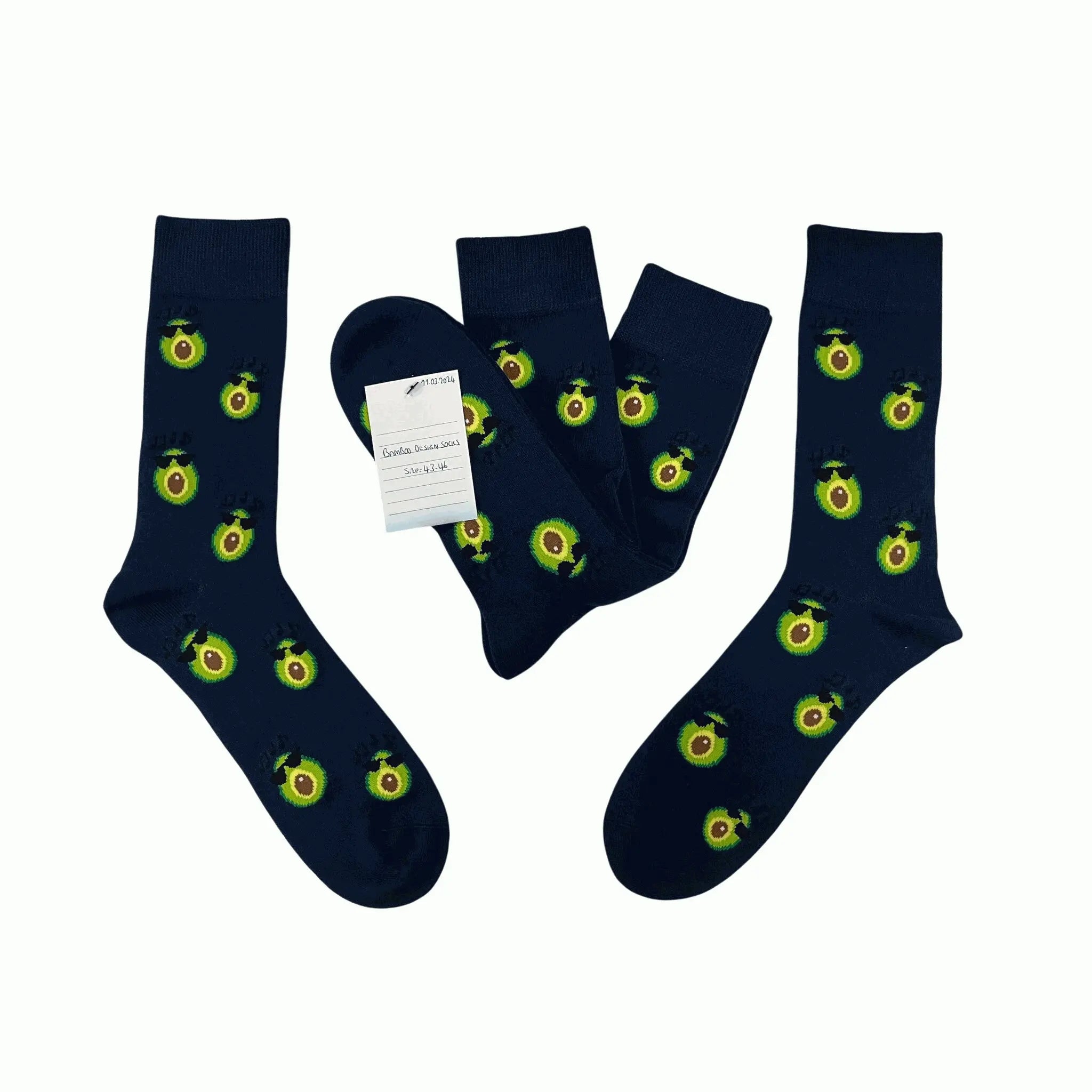 Flat lay of men’s bamboo socks with avocado print. Soft, breathable and ideal for gifting or adding fun to everyday outfits.