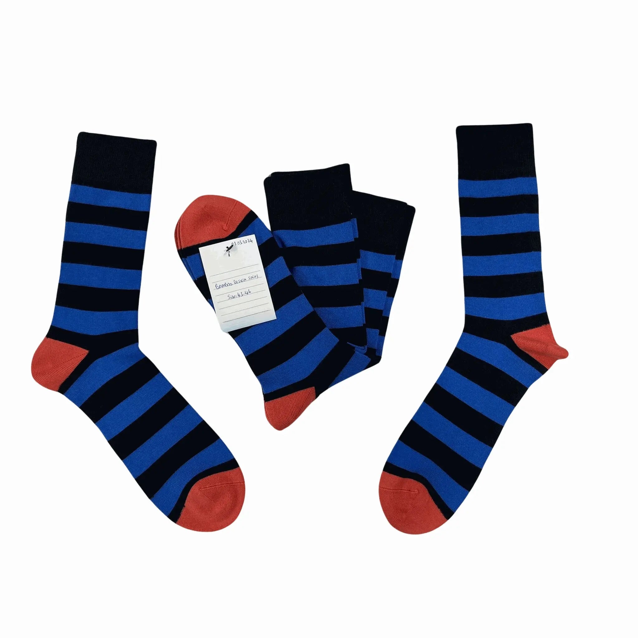 Flat lay of men’s bamboo socks with navy and blue stripes. Soft, breathable and stylish for everyday wear or gifting.