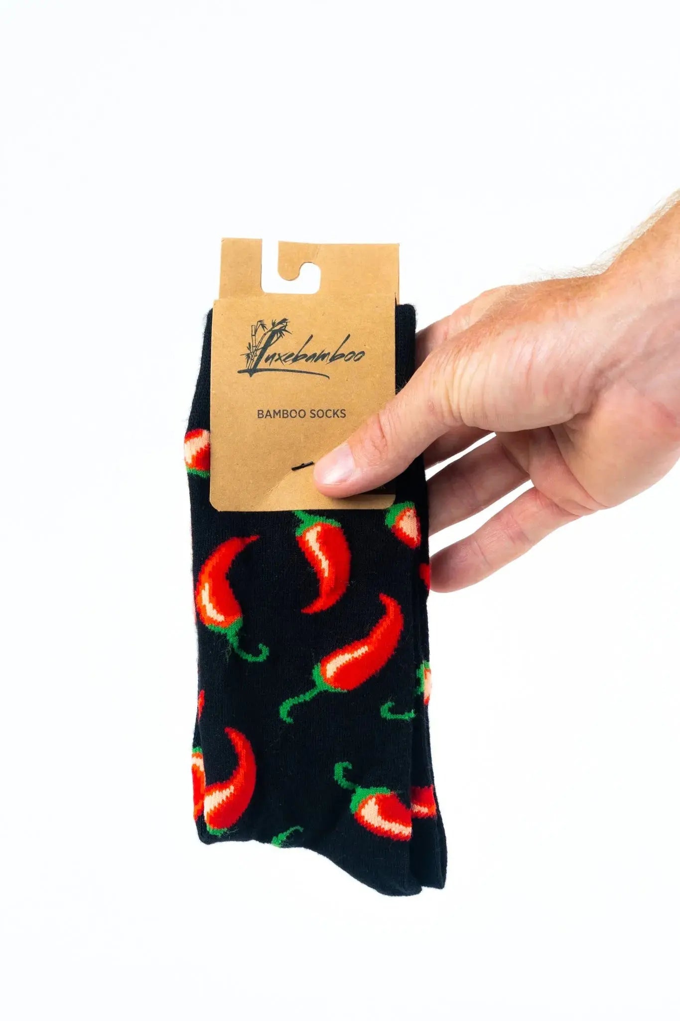 Black bamboo socks with red chilli pepper design, sustainable and stylish